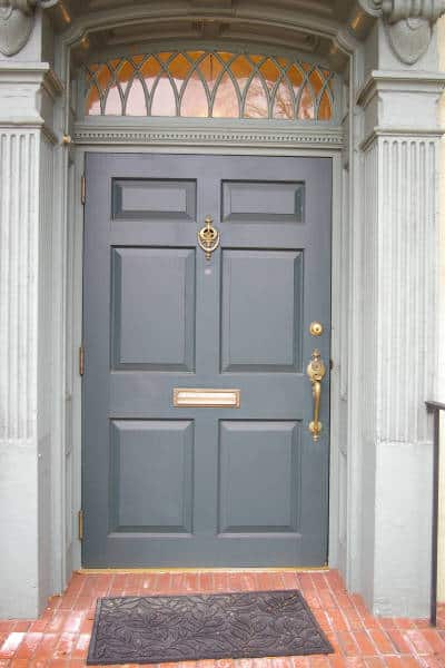 a gray door with a transom