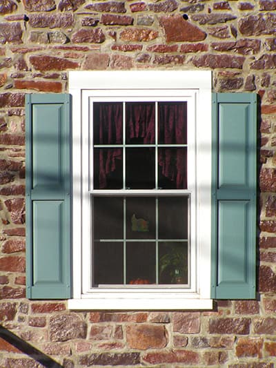 a window with shutters