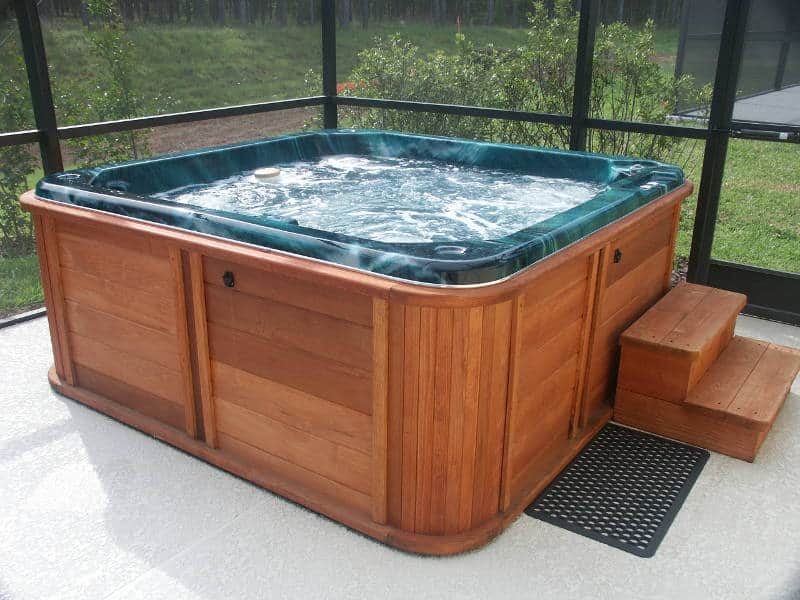 hot tub in a backyard