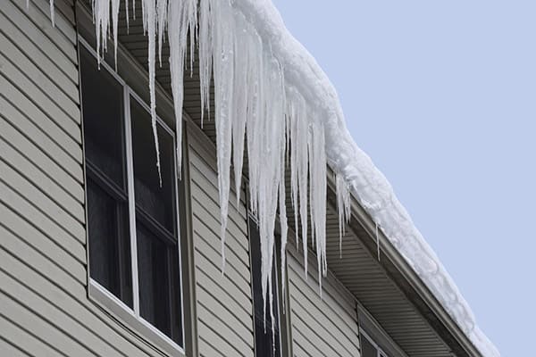 ice dams hanging from gutters