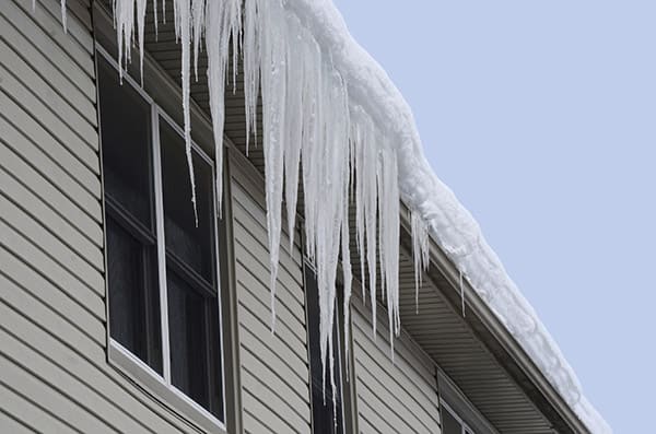 gutter ice dams hanging from gutters