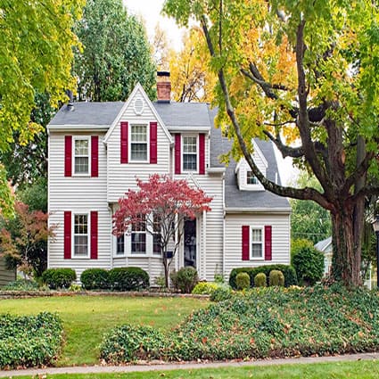 bigstock-House-in-Fall-with-Red-Shutter-292721734