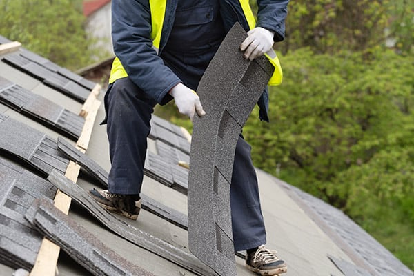 homeowner-roofing-a-house