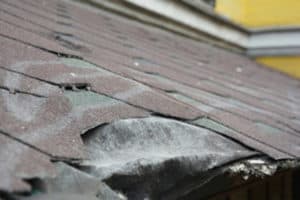 punctured roof shingles