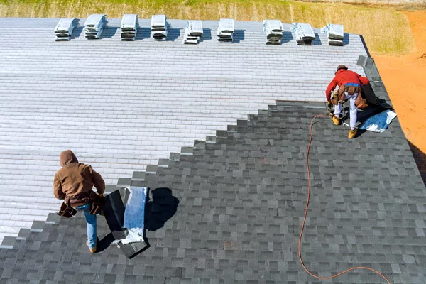 men installing a wind-resistant roof
